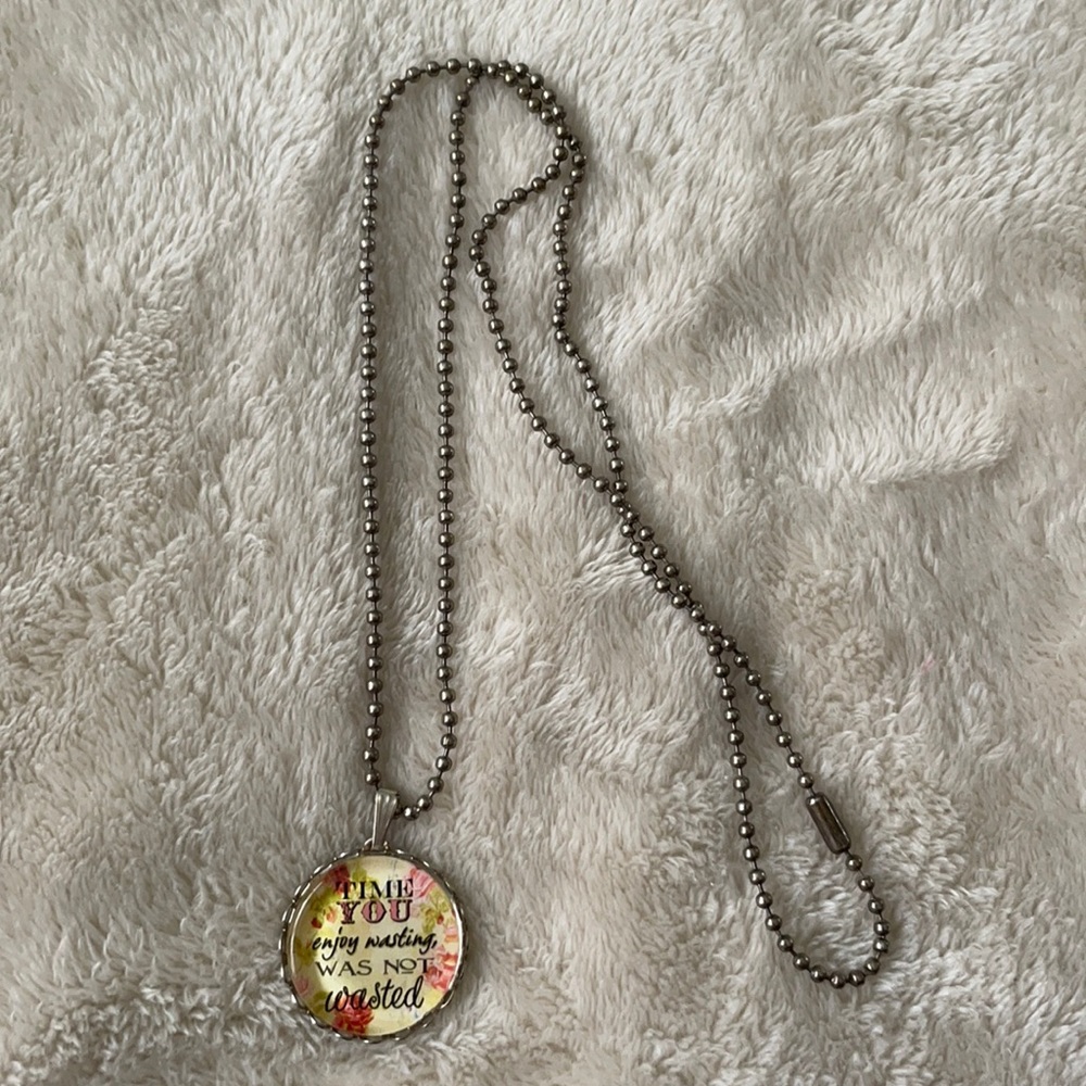 “Time you enjoy wasting was not wasted” necklace